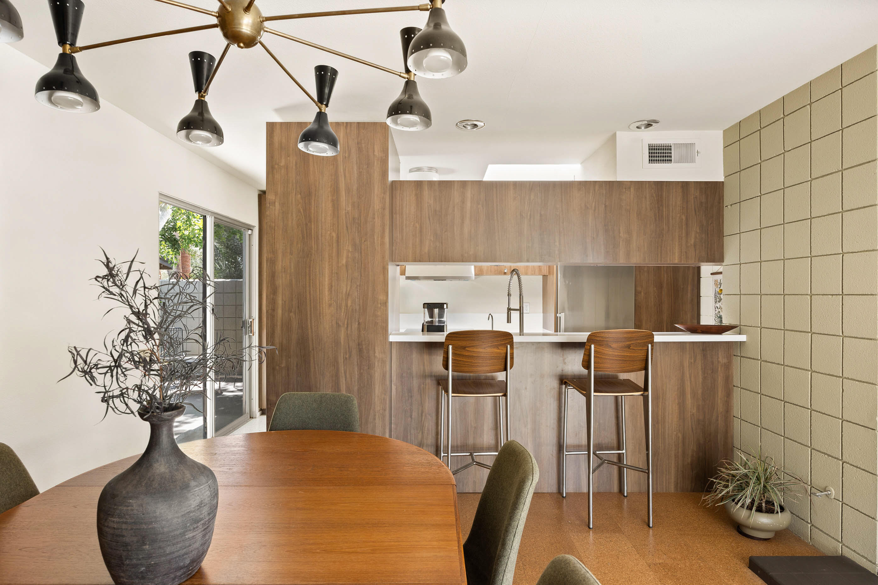 74110 Covered Wagon Trail Palm Desert, CA 92260 - Photo 26 of 44 a view of a kitchen with furniture and a rug