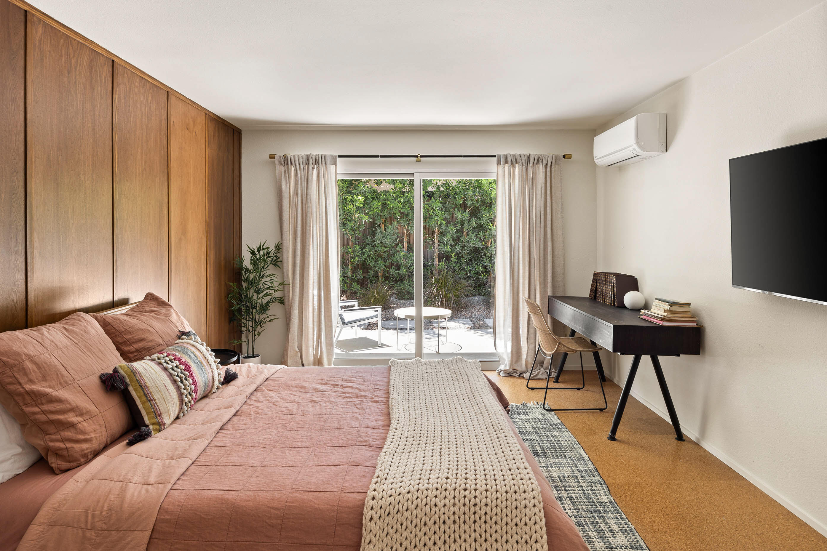 74110 Covered Wagon Trail Palm Desert, CA 92260 - Photo 33 of 44 a bedroom with a bed and a tv