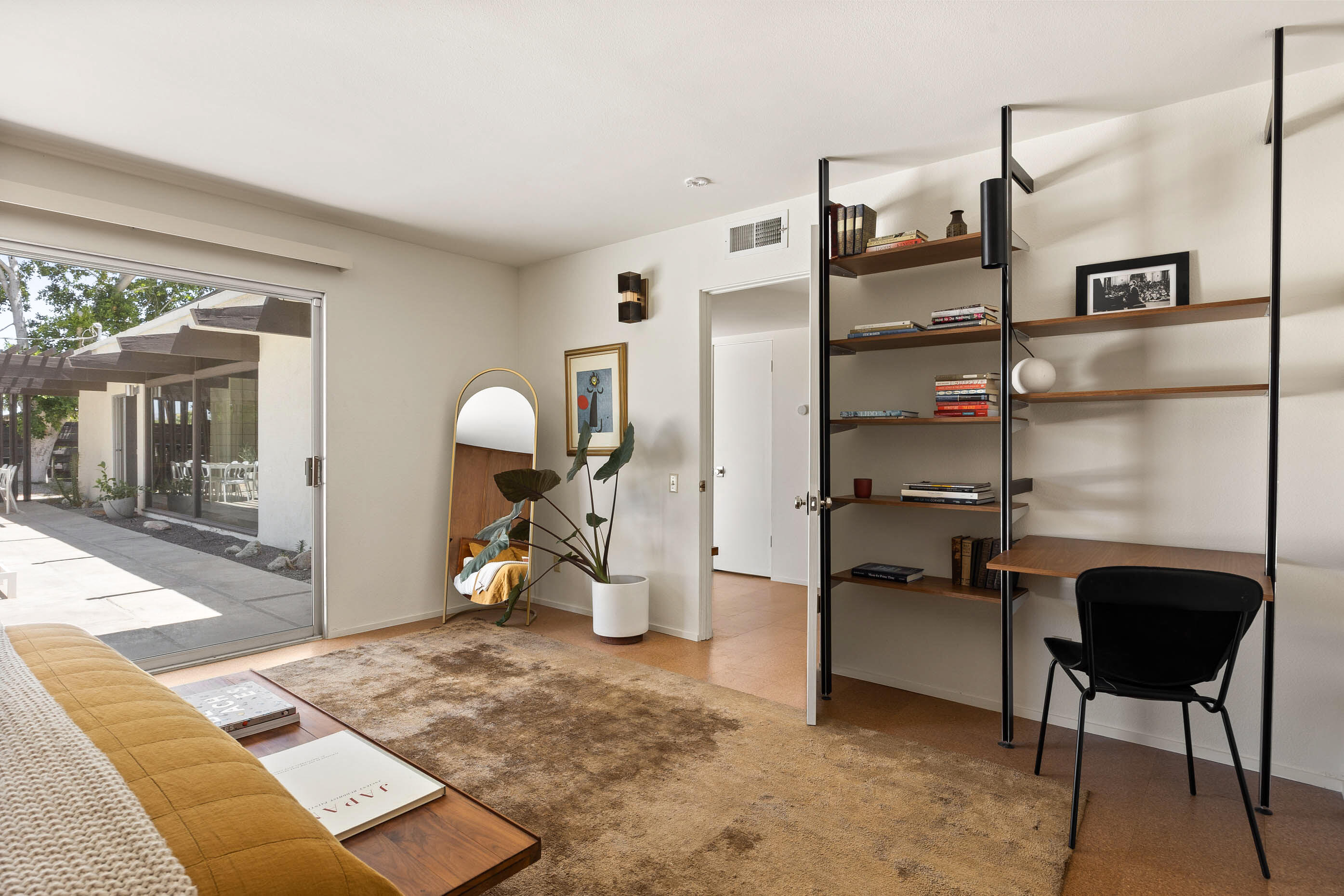 74110 Covered Wagon Trail Palm Desert, CA 92260 - Photo 40 of 44 a view of a hallway with workspace