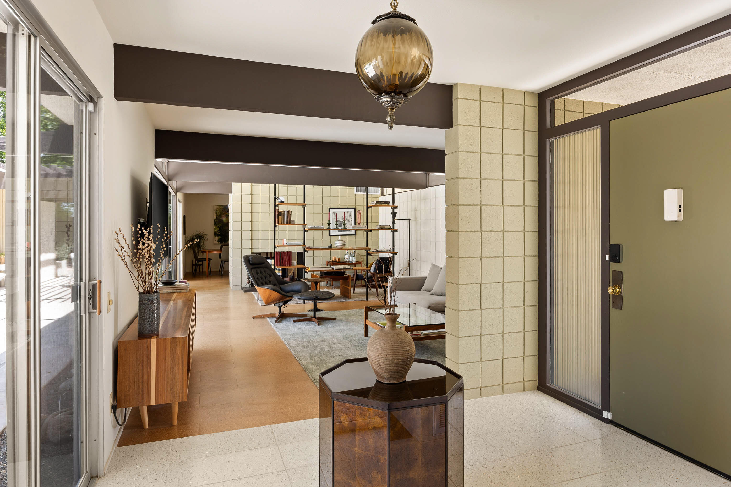 74110 Covered Wagon Trail Palm Desert, CA 92260 - Photo 44 of 44 a view of a dining room with furniture wooden floor and chandelier