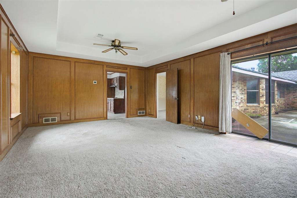 220 Green Ridge Drive Double Oak, TX 75077 - Photo 14 of 25 Step outside to the patio straight from the den.