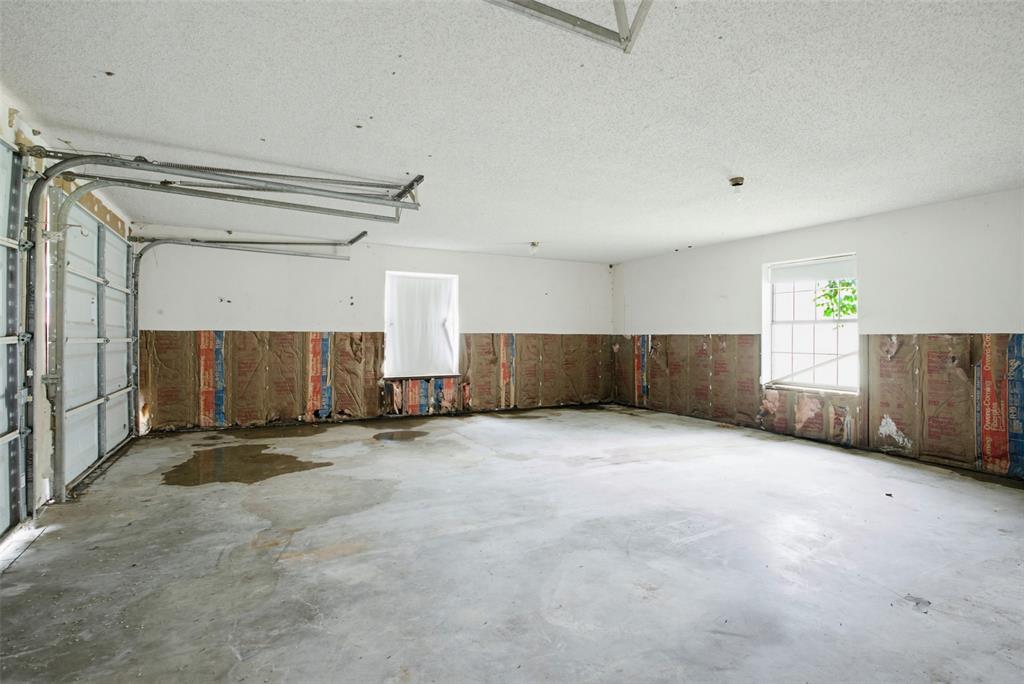 220 Green Ridge Drive Double Oak, TX 75077 - Photo 16 of 25 Your spacious garage even has great windows for natural light.