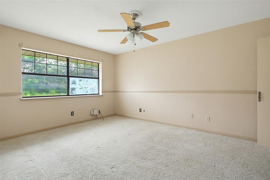 220 Green Ridge Drive Double Oak, TX 75077 - Photo 20 of 25 Secondary bedrooms provide privacy for guest and children