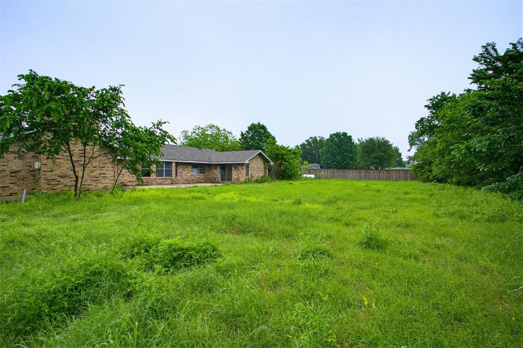 220 Green Ridge Drive Double Oak, TX 75077 - Photo 24 of 25 If you're wanting a place for a garden, family gatherings or maybe a pool, your backyard is large enough.