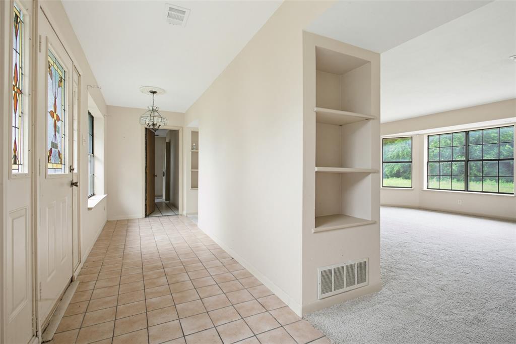 220 Green Ridge Drive Double Oak, TX 75077 - Photo 4 of 25 Wonderful entry greets you