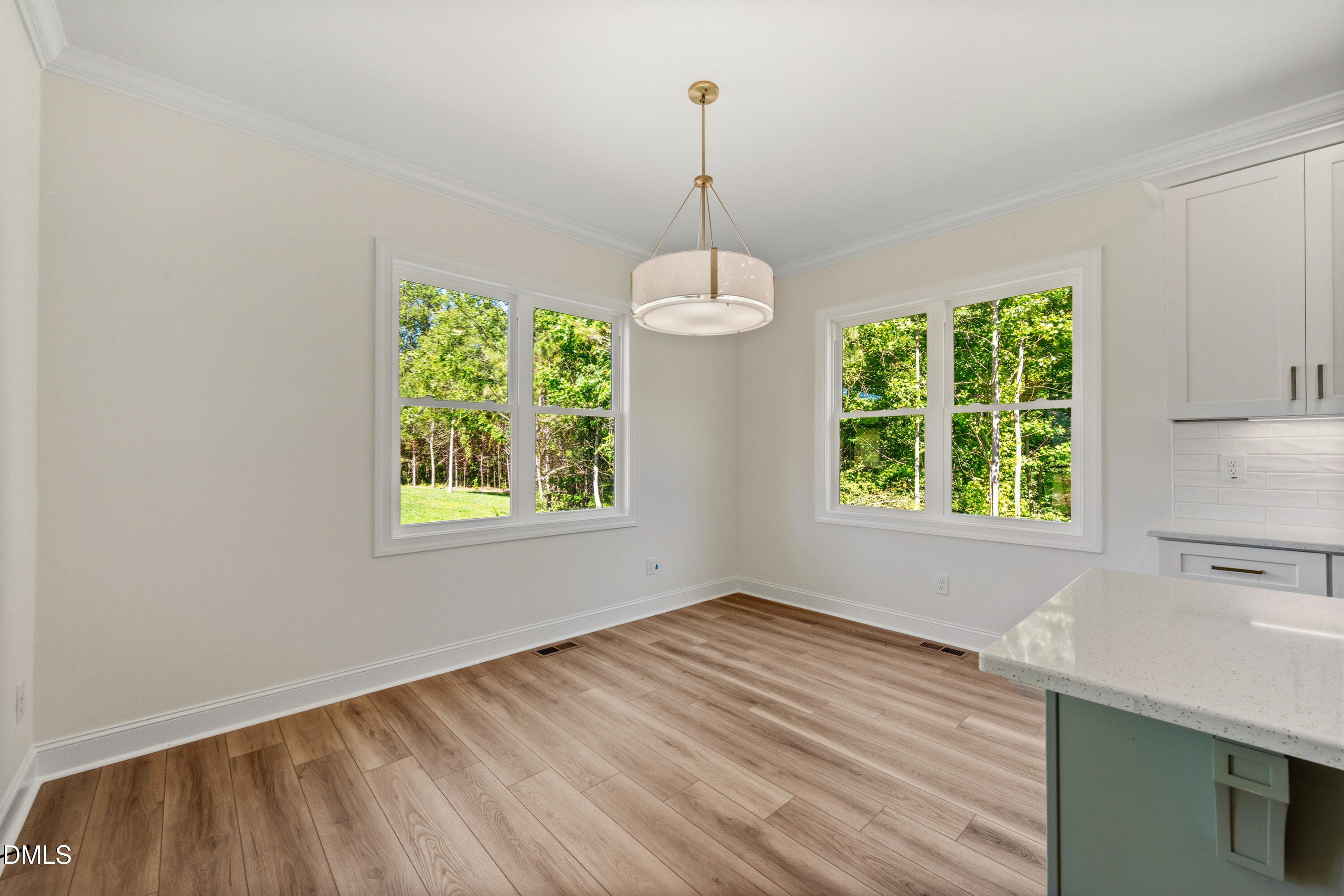 2251 Peachtree Hills Road Spring Hope, NC 27882 - Photo 15 of 46 a hallway with a window and wooden floor