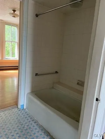 a bathroom with a bathtub