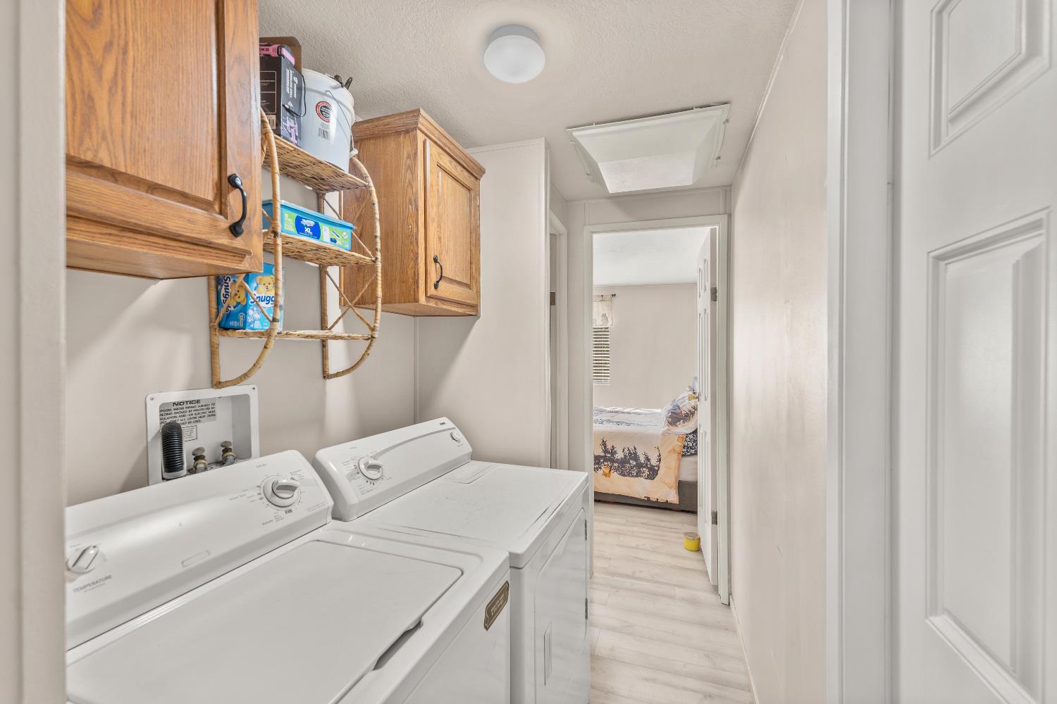 135 Ponderosa Way, Unit 2 Colfax, CA 95713 - Photo 14 of 33 a utility room with dryer and washer