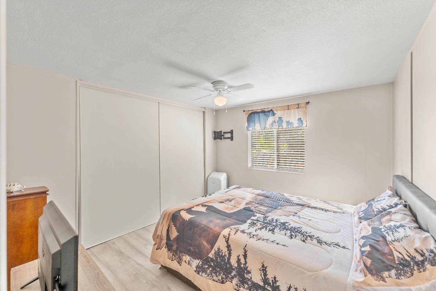 135 Ponderosa Way, Unit 2 Colfax, CA 95713 - Photo 15 of 33 a bedroom with a bed and a window