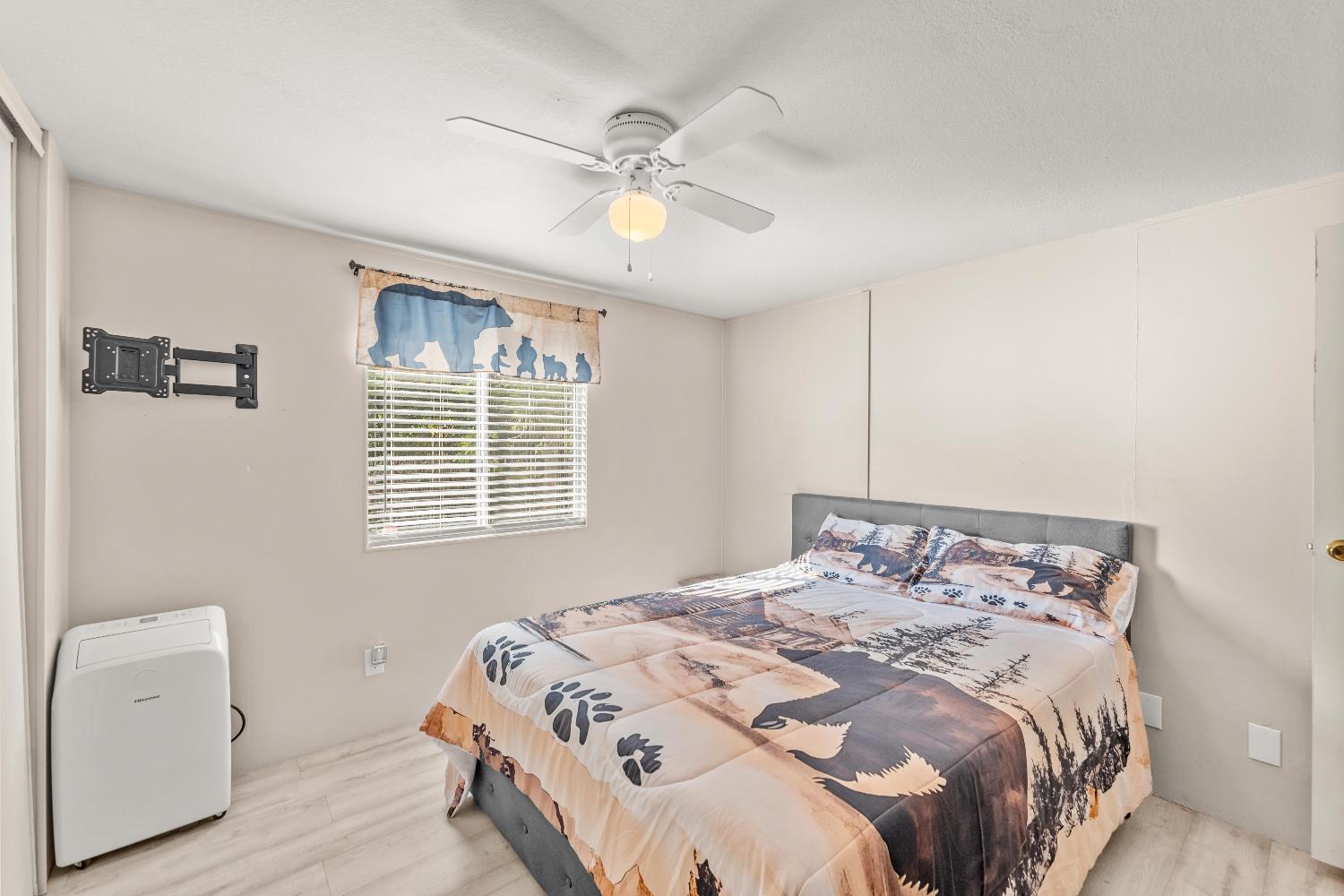 135 Ponderosa Way, Unit 2 Colfax, CA 95713 - Photo 16 of 33 a bedroom with a bed and a window
