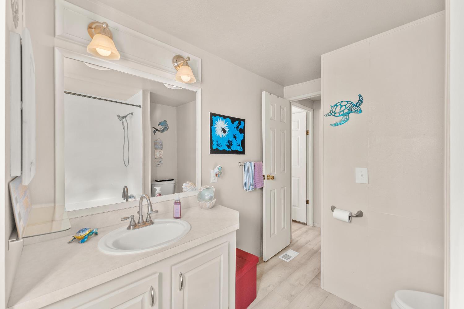 135 Ponderosa Way, Unit 2 Colfax, CA 95713 - Photo 19 of 33 a en suite bathroom with a granite countertop sink and a mirror
