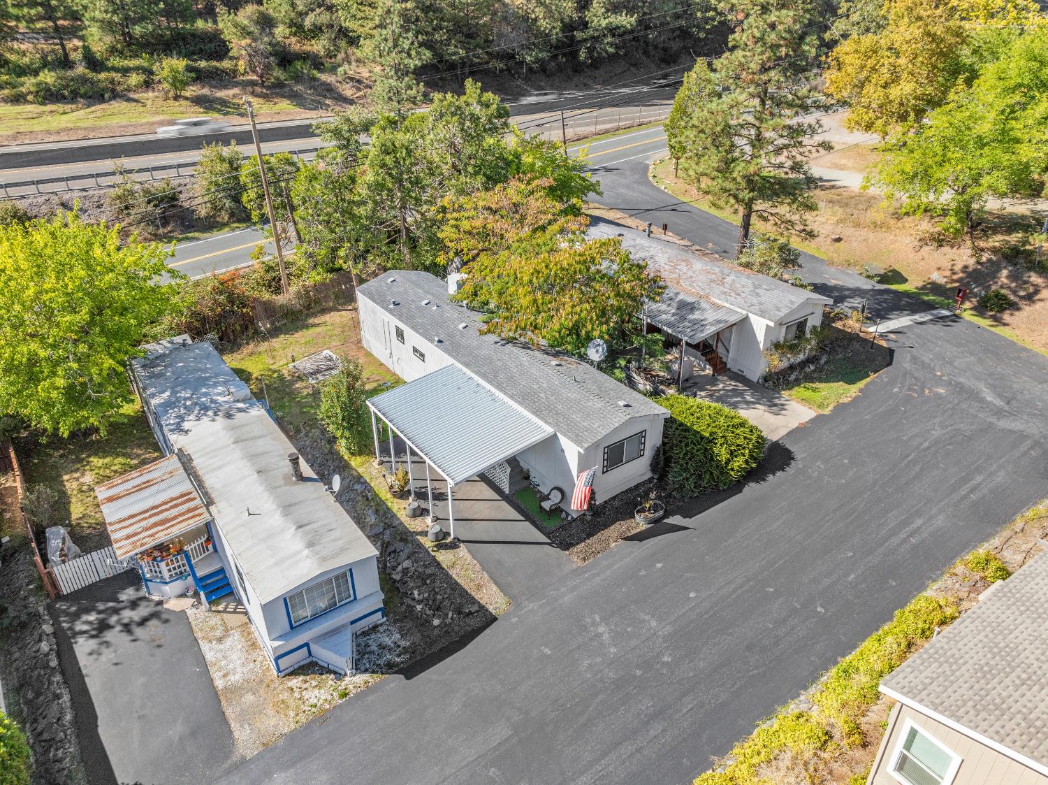 135 Ponderosa Way, Unit 2 Colfax, CA 95713 - Photo 27 of 33 an aerial view of a house with a yard and garden