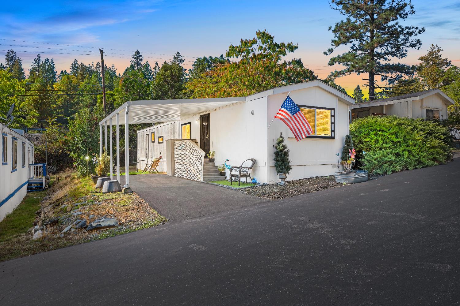 135 Ponderosa Way, Unit 2 Colfax, CA 95713 - Photo 33 of 33 a front view of a house with a yard and garage