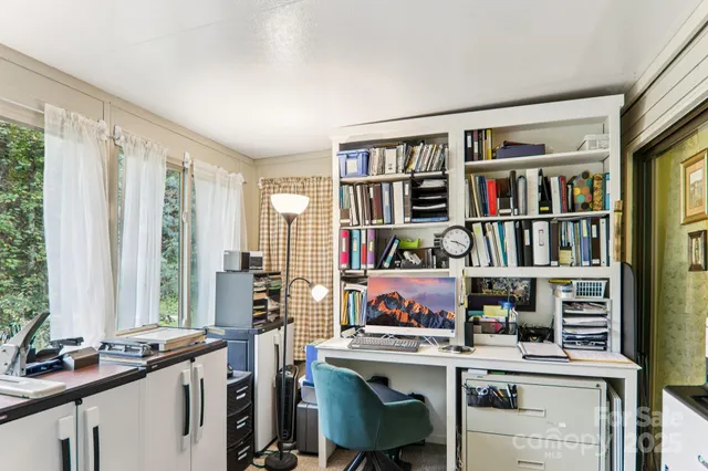 a bathroom with a sink toilet and a mirror