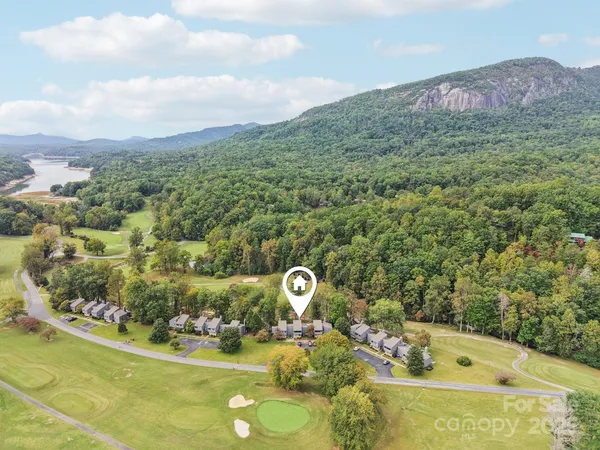a view of a swimming pool with a garden