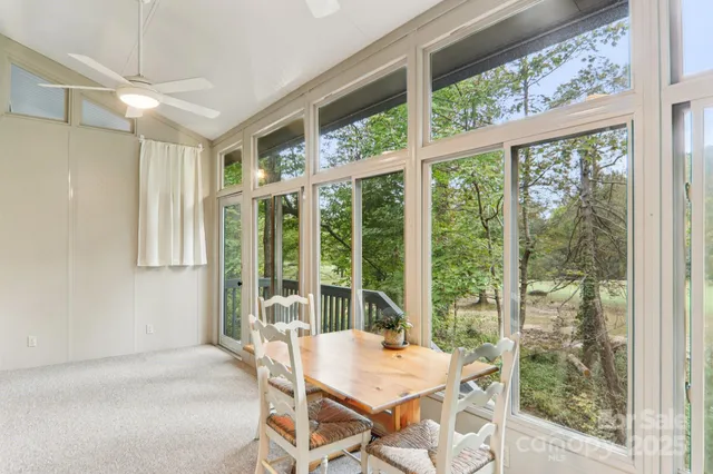 a view of a golf course with a lake