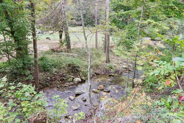 a terrace of a house with table and chairs