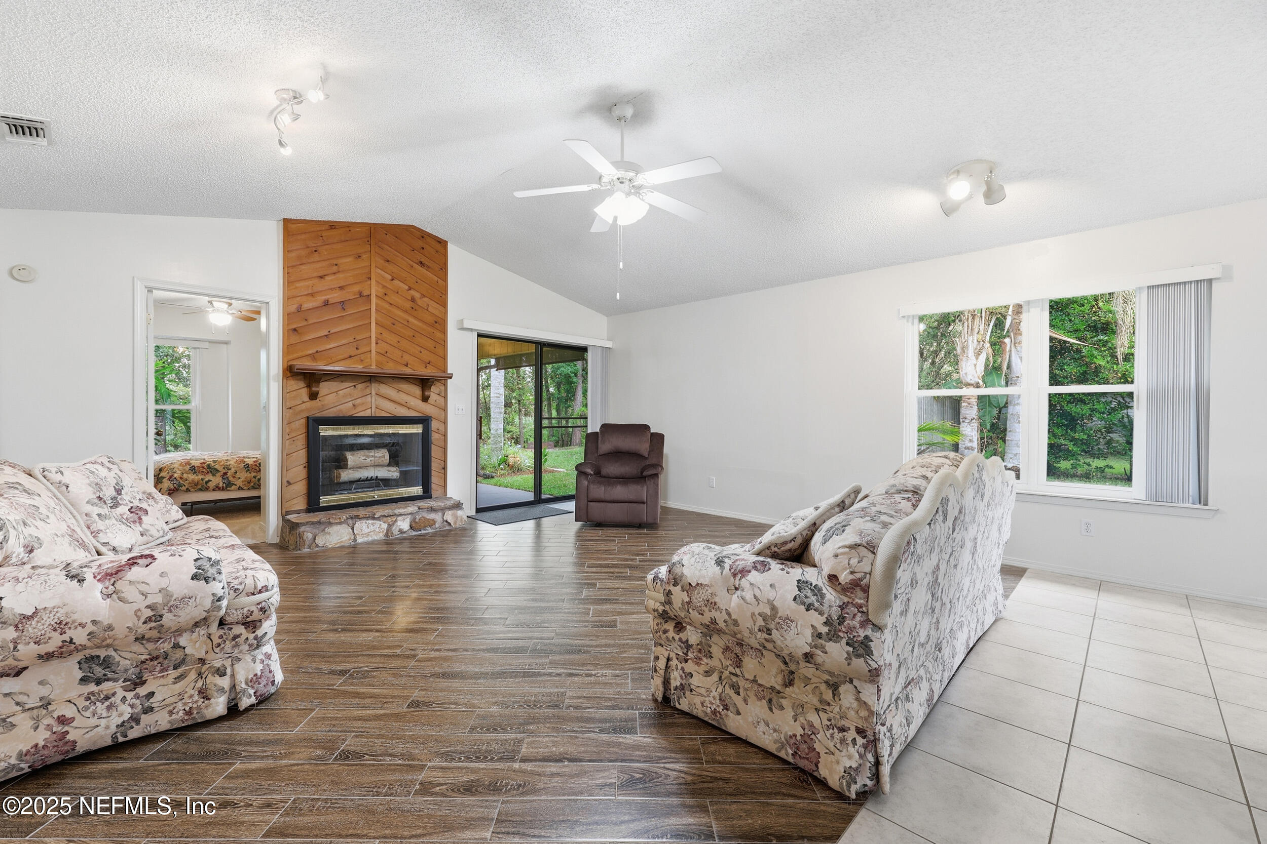 1828 Killarn Circle Middleburg, FL 32068 - Photo 12 of 28 a living room with furniture and a fireplace