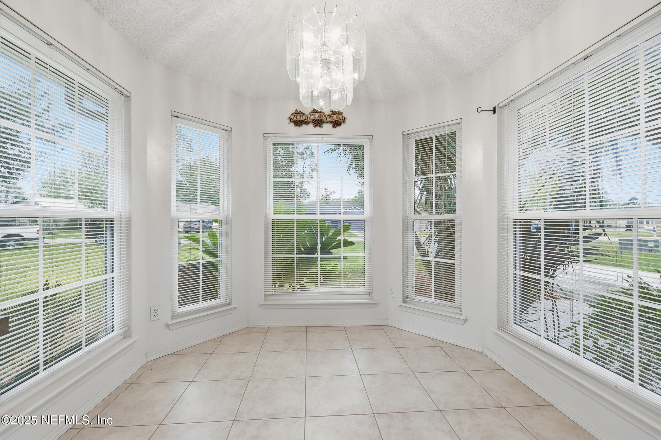 1828 Killarn Circle Middleburg, FL 32068 - Photo 20 of 28 a view of an empty room with windows