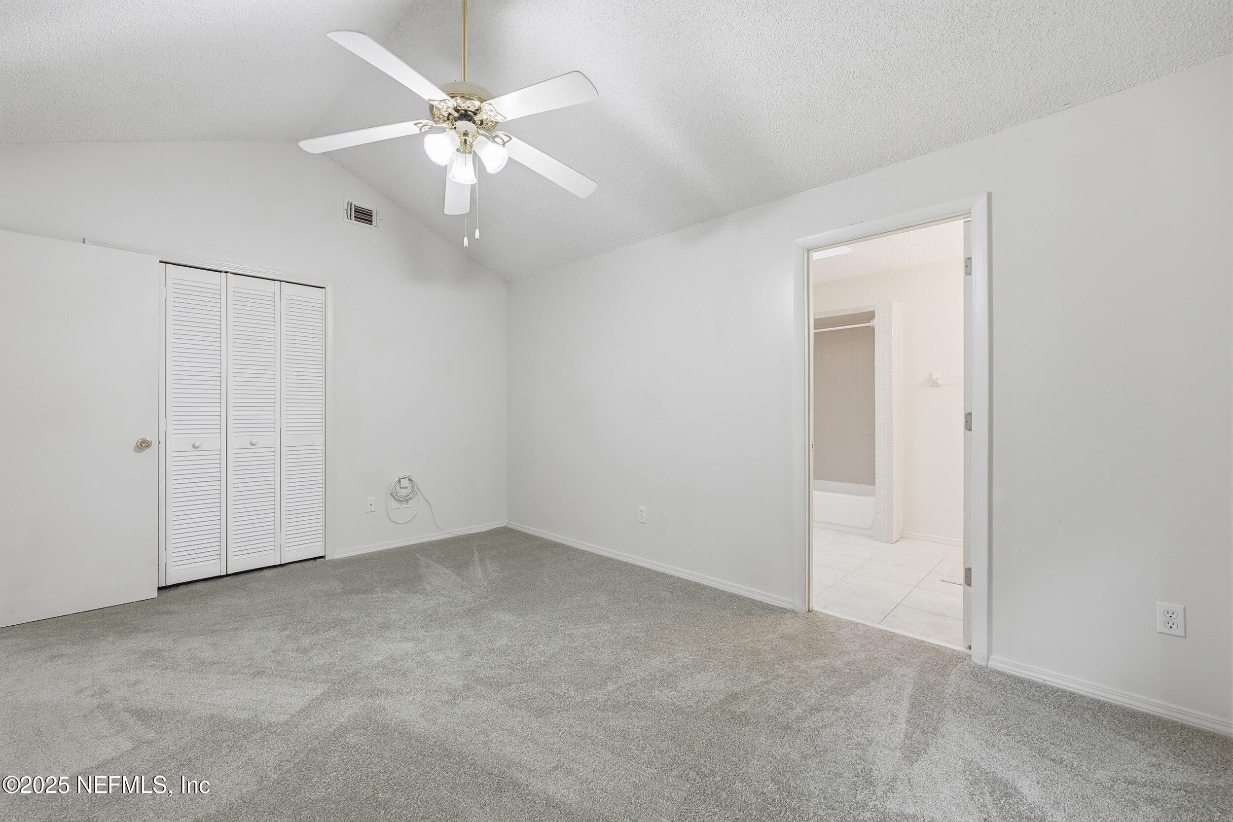 1828 Killarn Circle Middleburg, FL 32068 - Photo 22 of 28 a view of an empty room with a ceiling fan