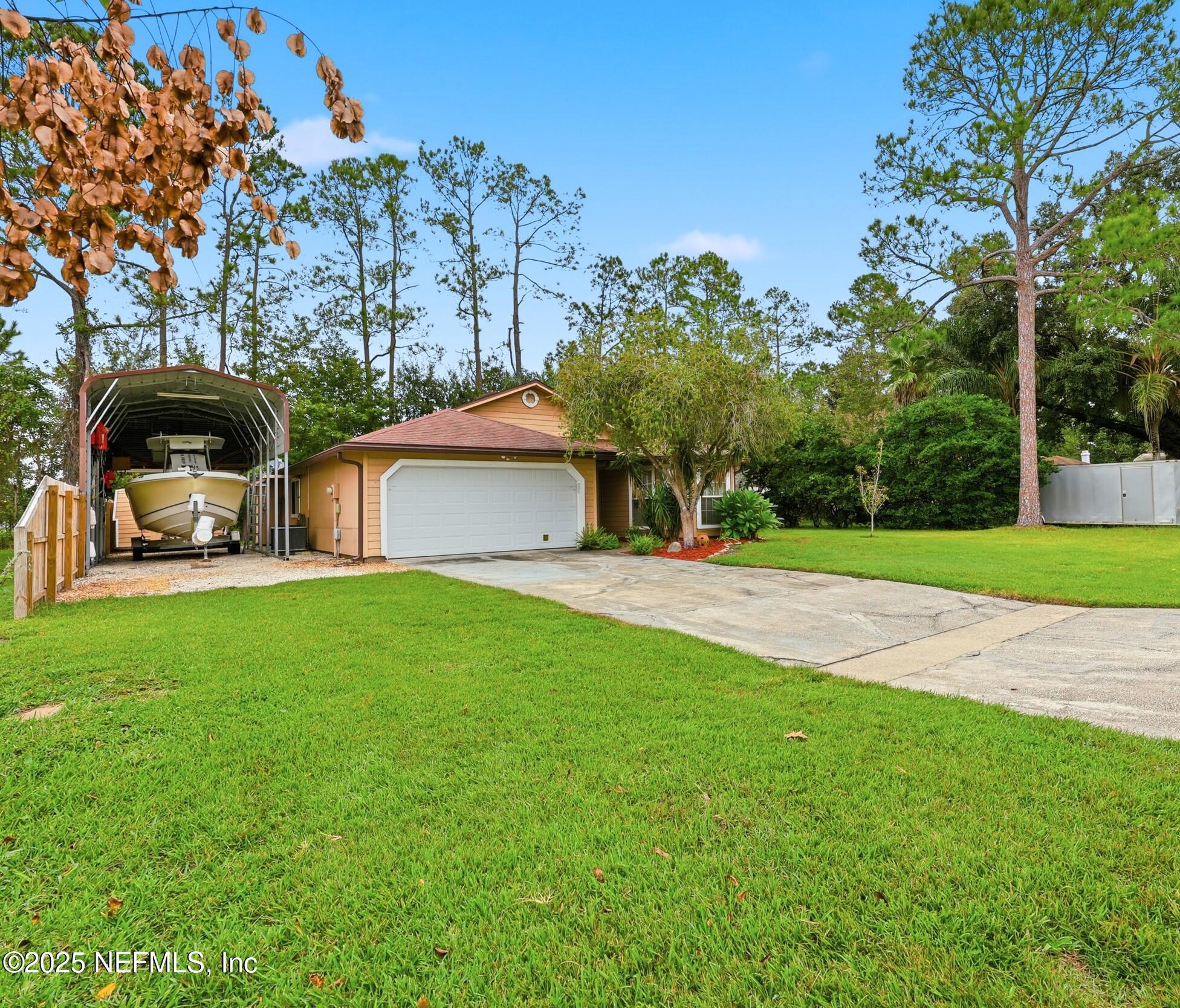 1828 Killarn Circle Middleburg, FL 32068 - Photo 8 of 28 a front view of a house with garden