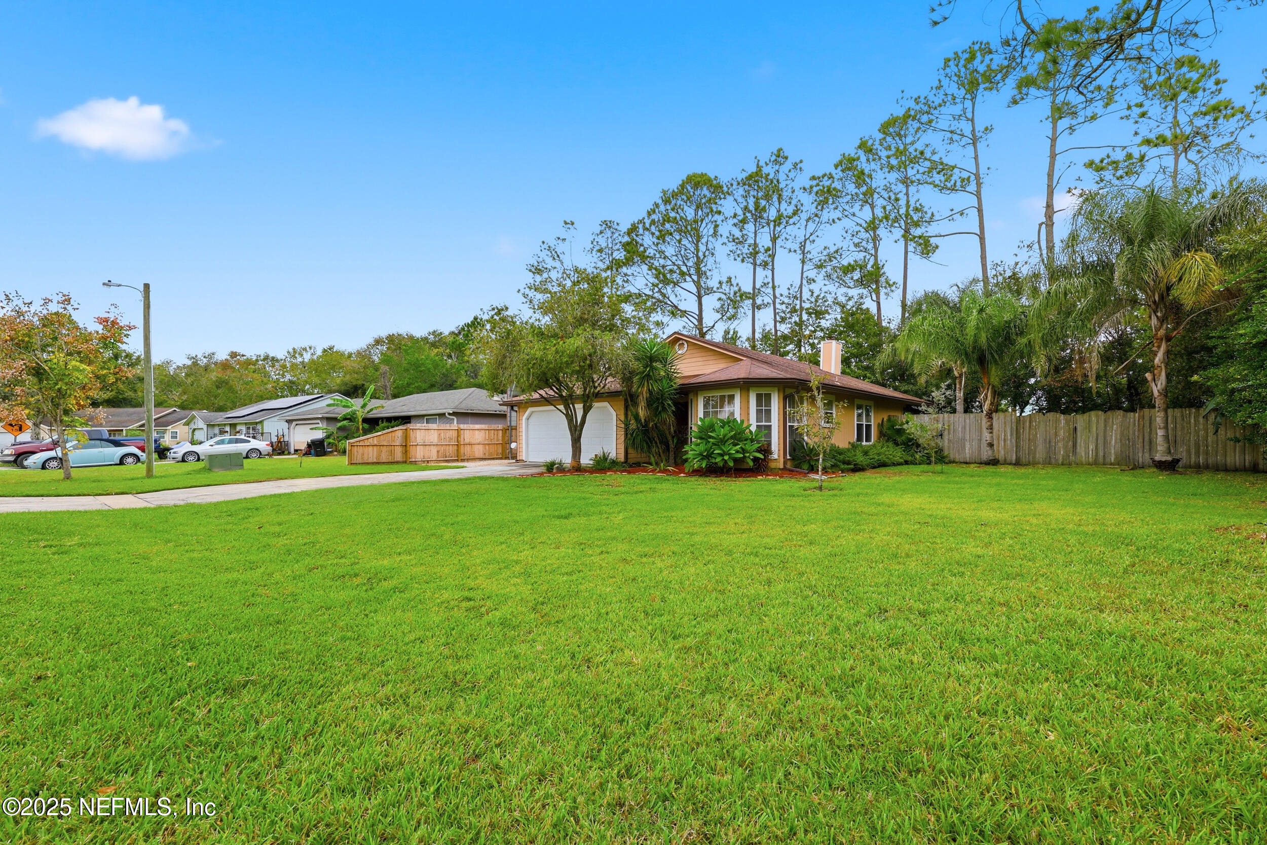 1828 Killarn Circle Middleburg, FL 32068 - Photo 9 of 28 a view of a garden with a house in the background