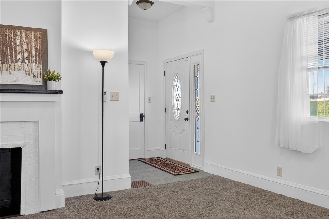 107 Riverside Drive Piqua, OH 45356 - Photo 4 of 69 This bright and inviting entryway offers a warm welcome to all who enter.