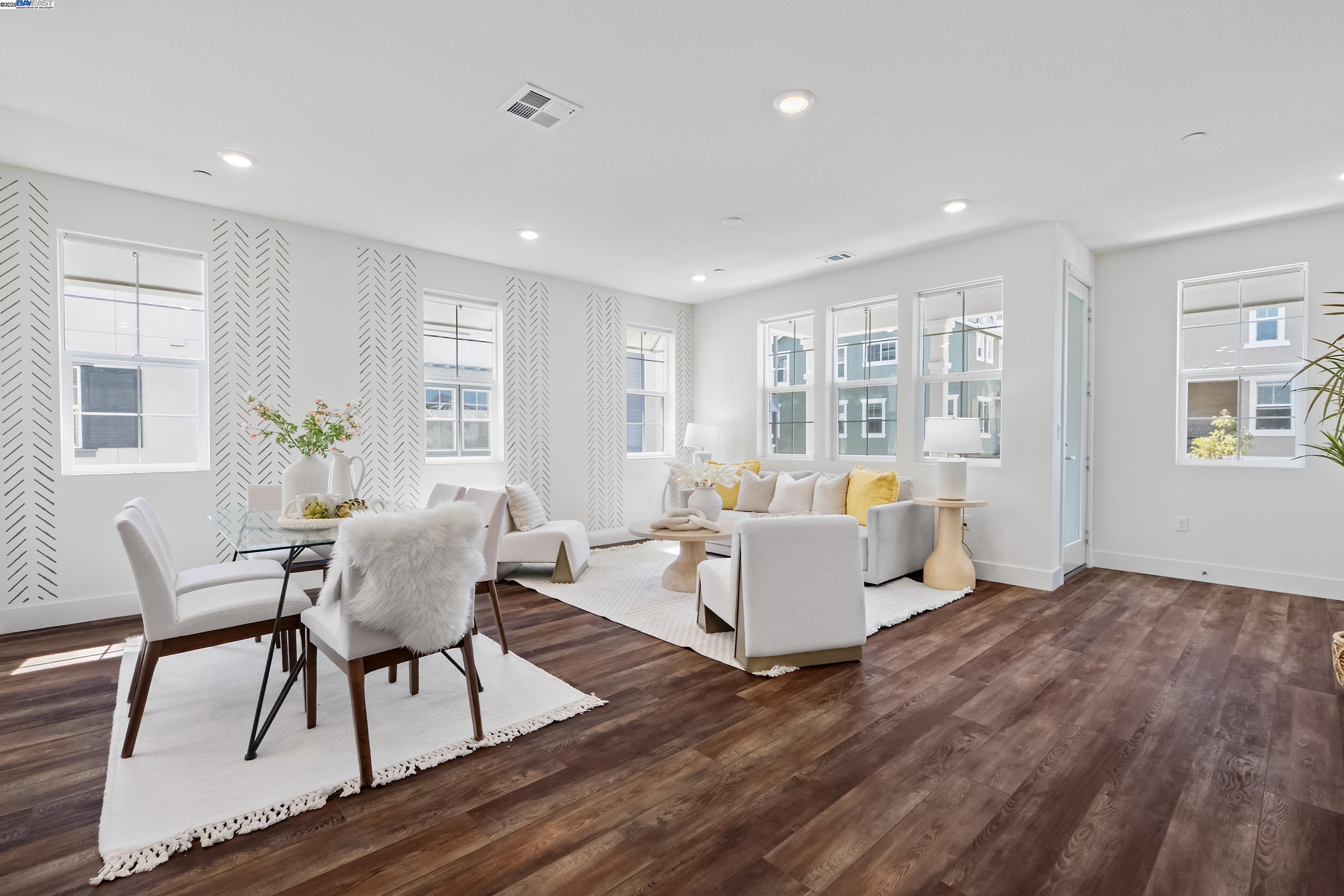 37428 Bowline Road Newark, CA 94560 - Photo 1 of 1 a living room with furniture and a wooden floor
