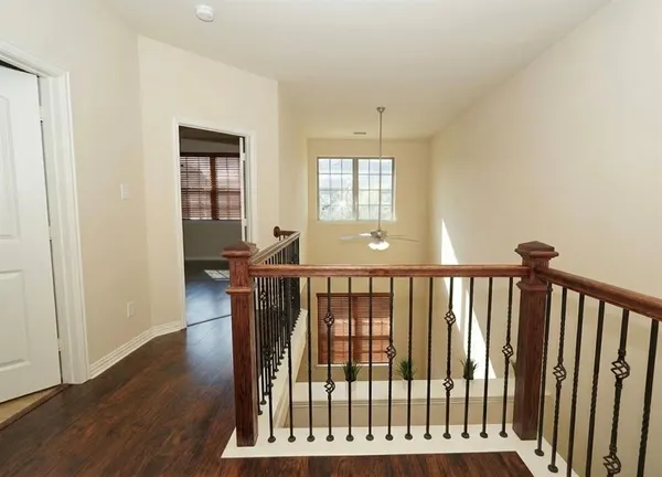 a view of entryway with wooden floor