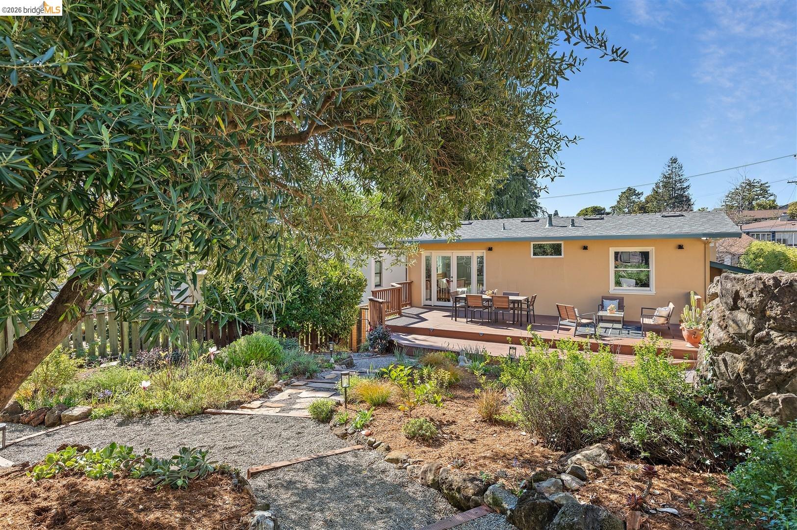 1950 Hopkins Street Berkeley, CA 94707 - Photo 30 of 57 a view of a house with backyard and sitting area