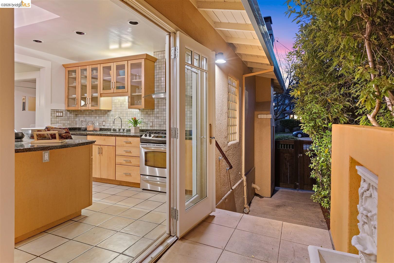 1950 Hopkins Street Berkeley, CA 94707 - Photo 40 of 57 a kitchen with stainless steel appliances granite countertop a refrigerator and a stove