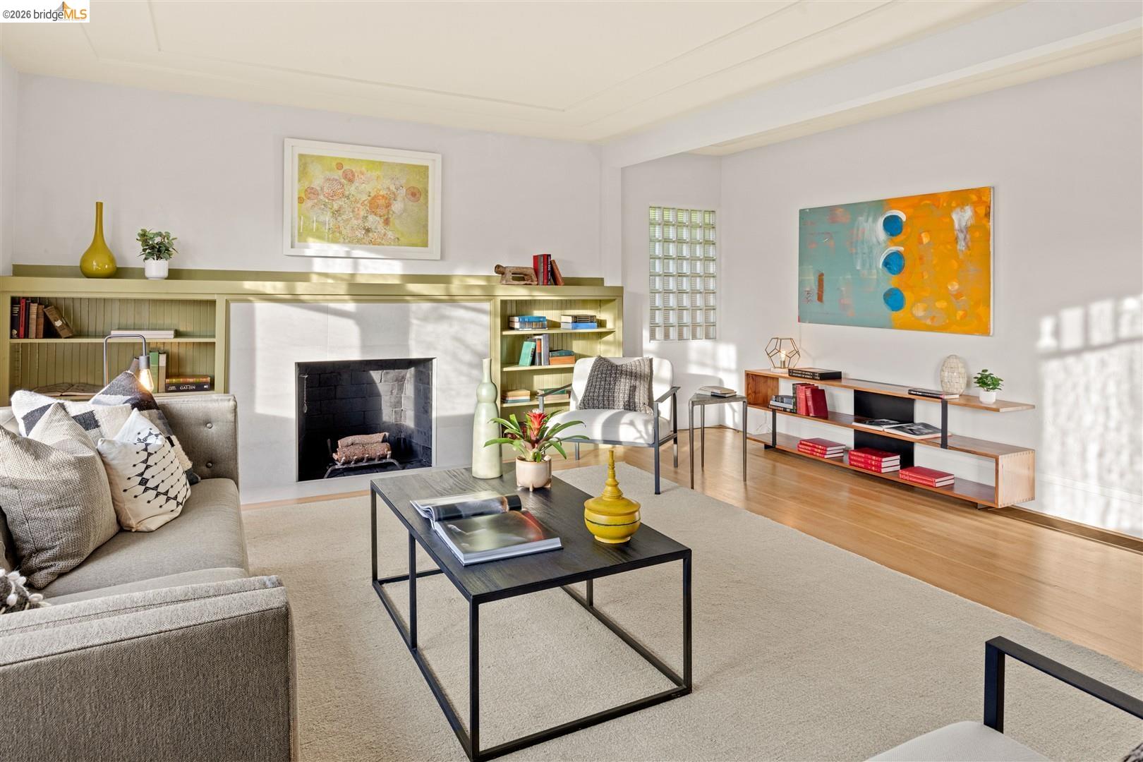 1950 Hopkins Street Berkeley, CA 94707 - Photo 6 of 57 a living room with furniture and a fireplace