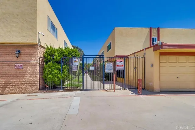 a view of a house with a street