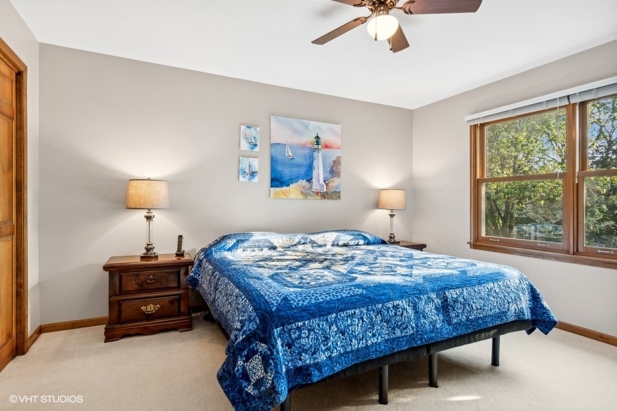 809 Hyde Park Lane Naperville, IL 60565 - Photo 12 of 30 a bedroom with a bed and a window