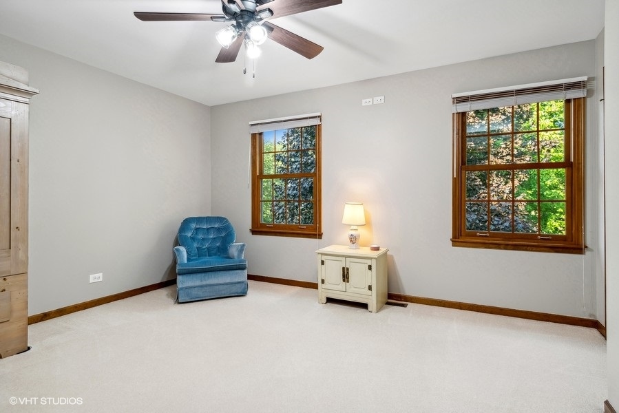 809 Hyde Park Lane Naperville, IL 60565 - Photo 16 of 30 a living room with furniture and a window