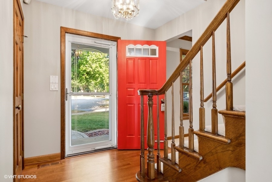 809 Hyde Park Lane Naperville, IL 60565 - Photo 3 of 30 a view of an entryway with hardwood