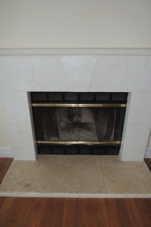 763 Bradley Road Springfield, MA 01109 - Photo 3 of 14 a living room with a fireplace