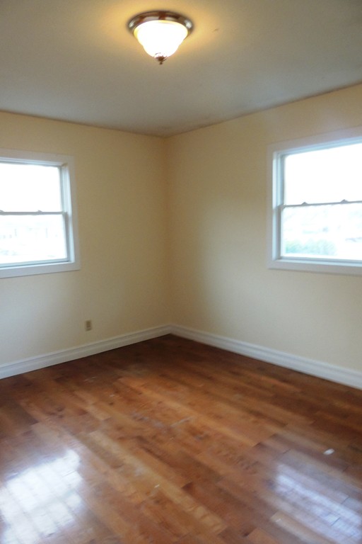 763 Bradley Road Springfield, MA 01109 - Photo 8 of 14 an empty room with a window