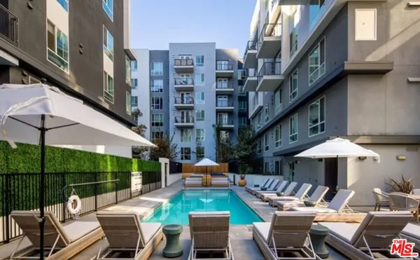 a view of yard with outdoor seating and city view