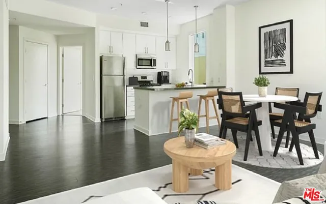 a kitchen with a sink stove and microwave
