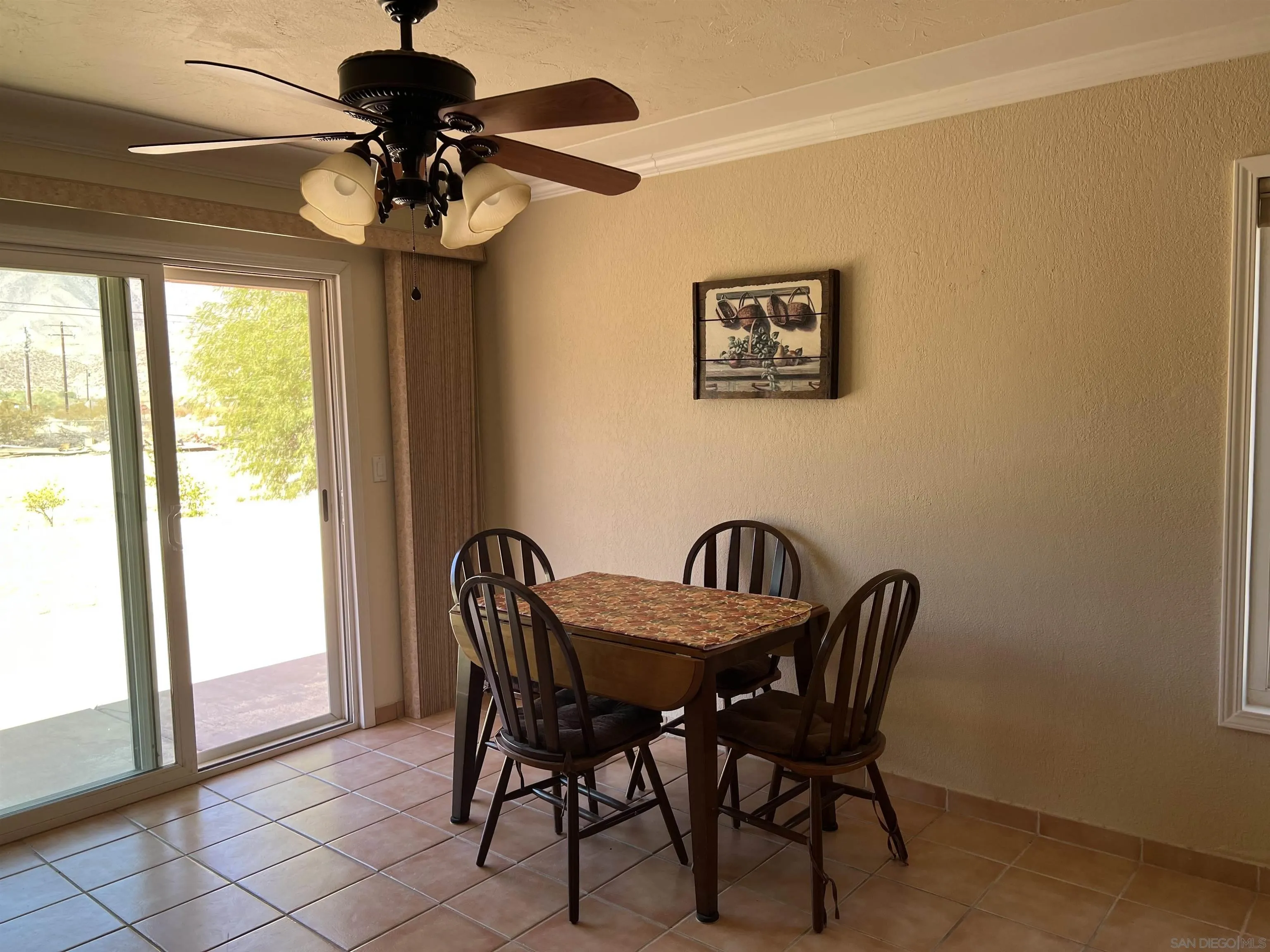 2960 Frying Pan Road Borrego Springs, CA 92004 - Photo 14 of 27 a view of a dining room that has a table and chairs
