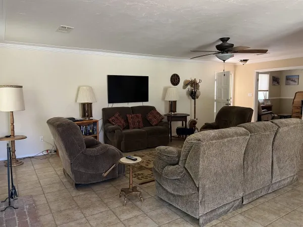 a room with furniture and a fireplace