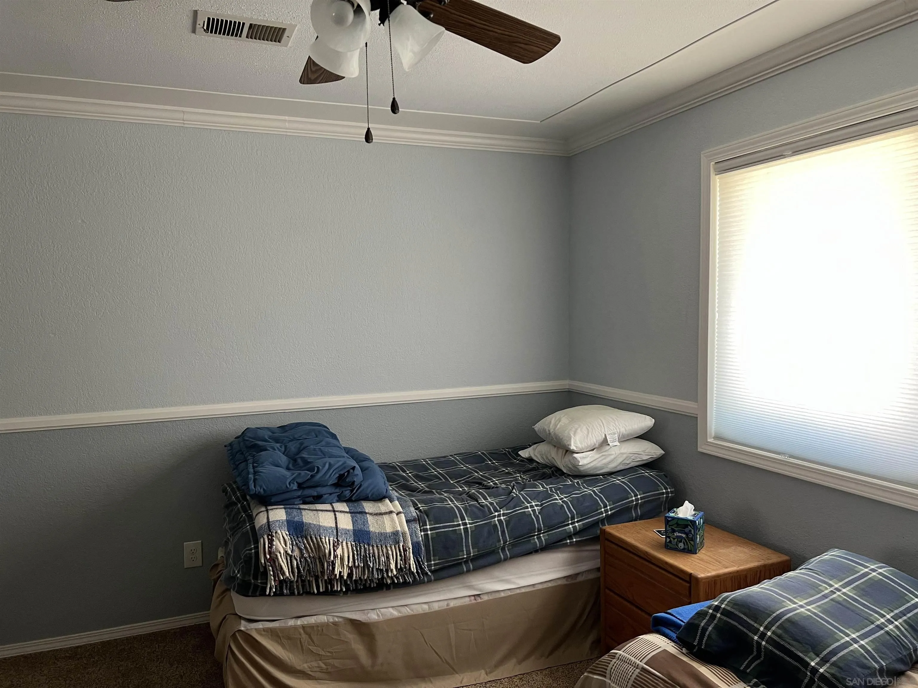 2960 Frying Pan Road Borrego Springs, CA 92004 - Photo 25 of 27 a living room with a couch and a window