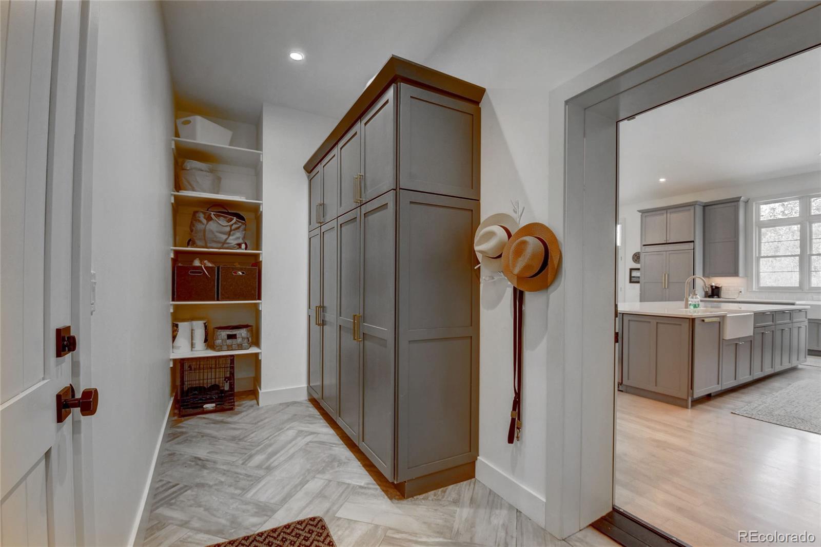 5151 West Wagon Trail Road Littleton, CO 80123 - Photo 24 of 37 a view of a storage & utility room with closet