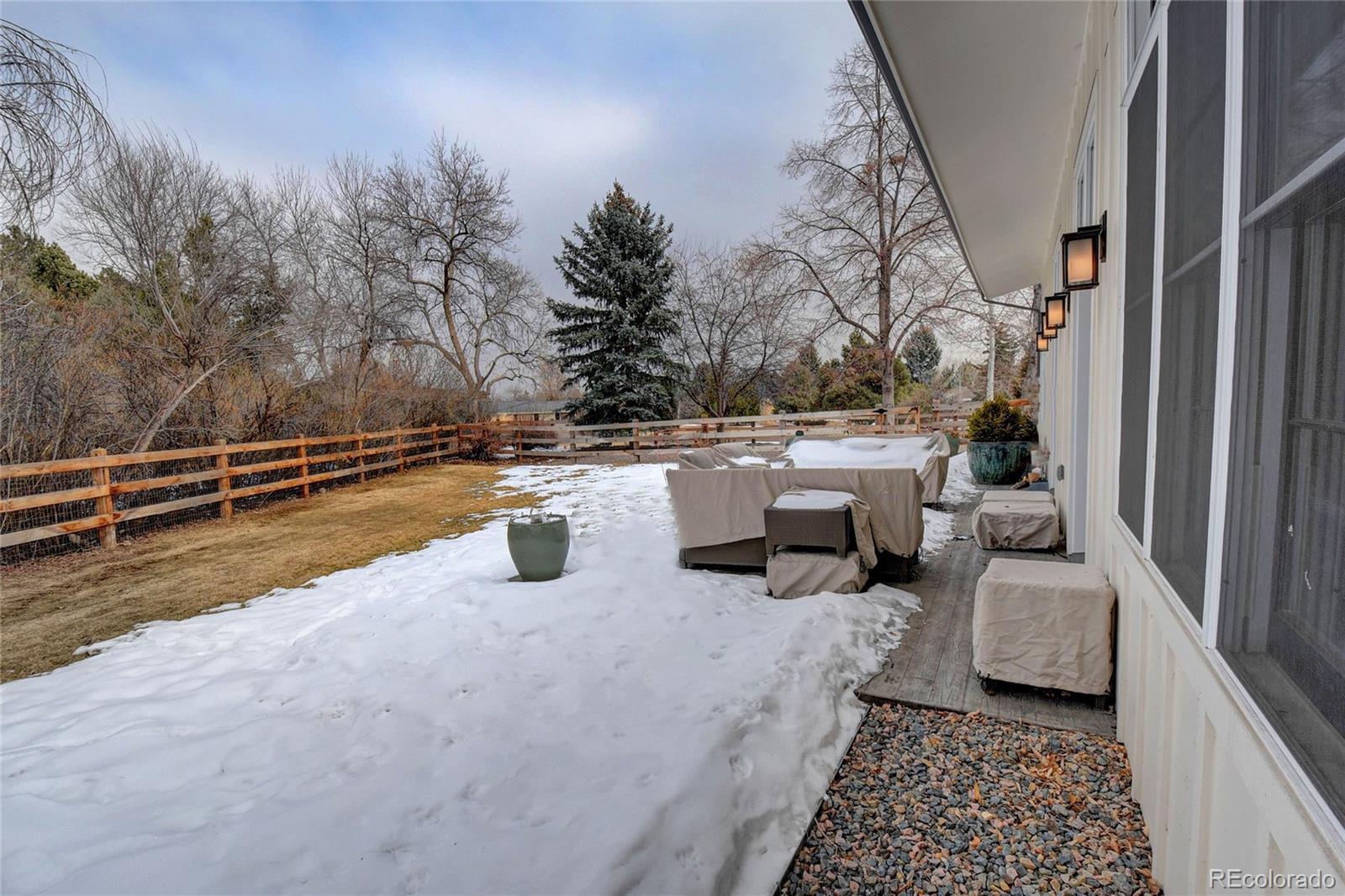 5151 West Wagon Trail Road Littleton, CO 80123 - Photo 36 of 37 a view of a terrace with furniture