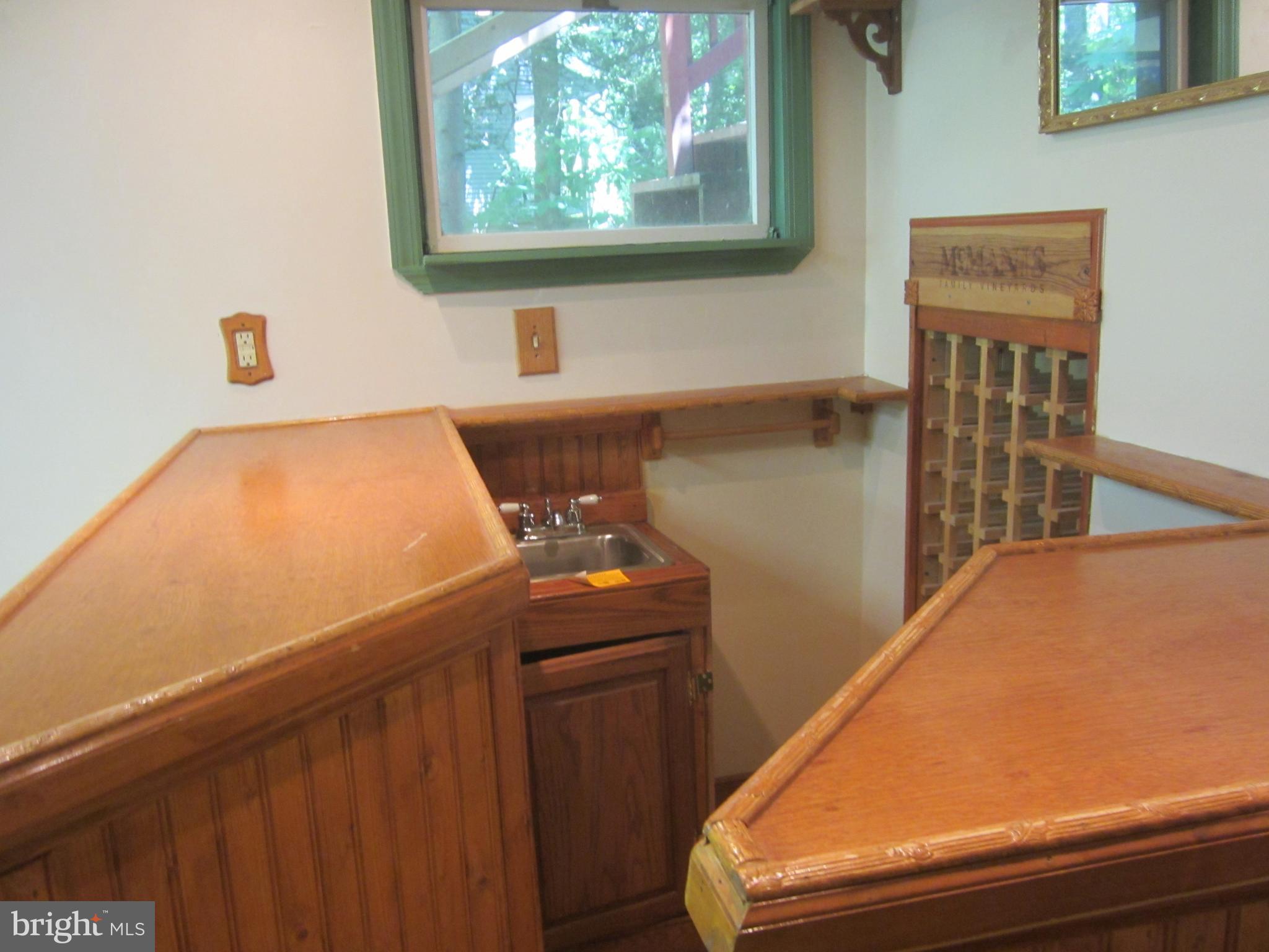 3421 Holland Cliffs Road Huntingtown, MD 20639 - Photo 11 of 19 a room with storage and utility