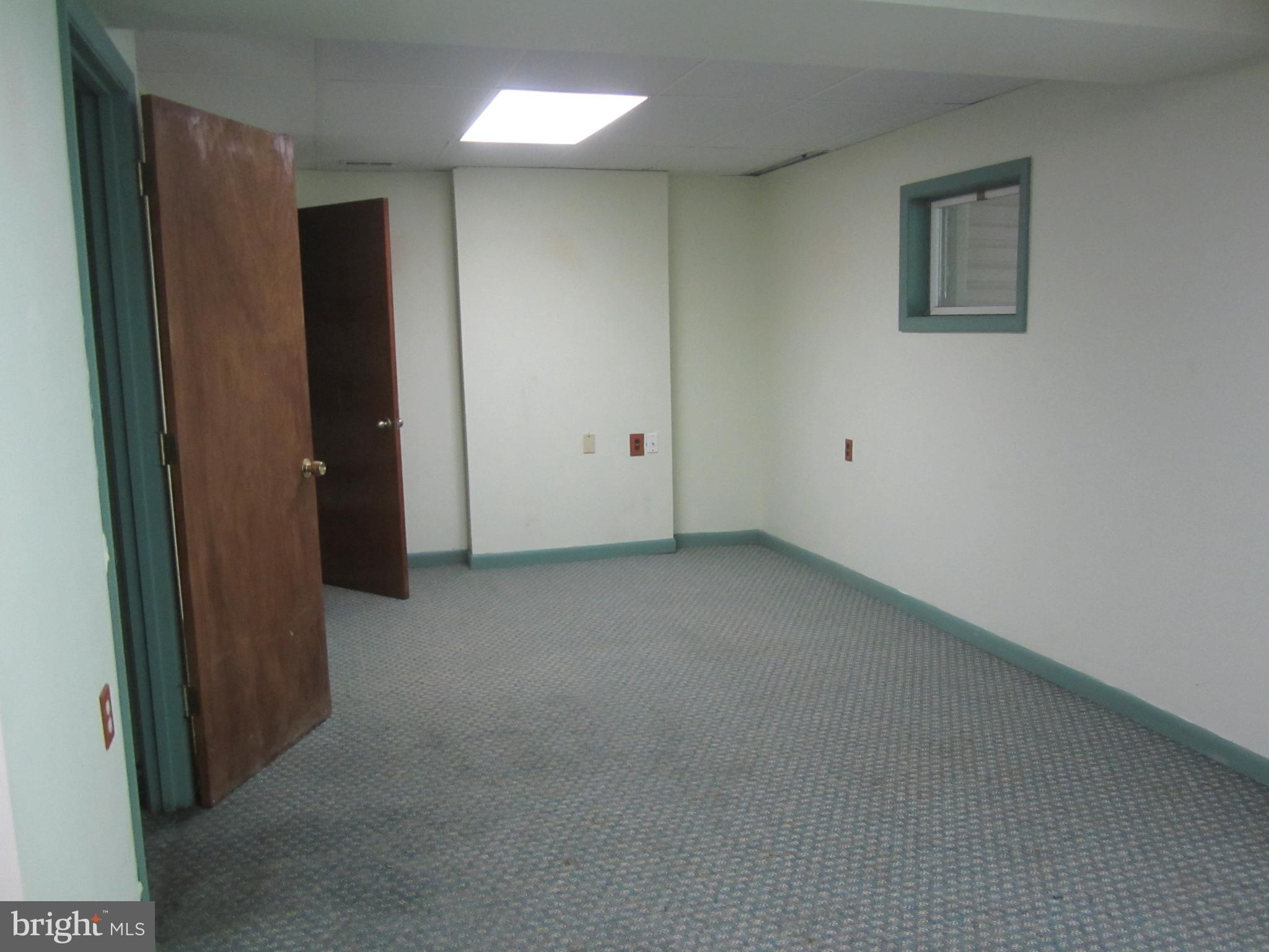 3421 Holland Cliffs Road Huntingtown, MD 20639 - Photo 12 of 19 an empty room with closet