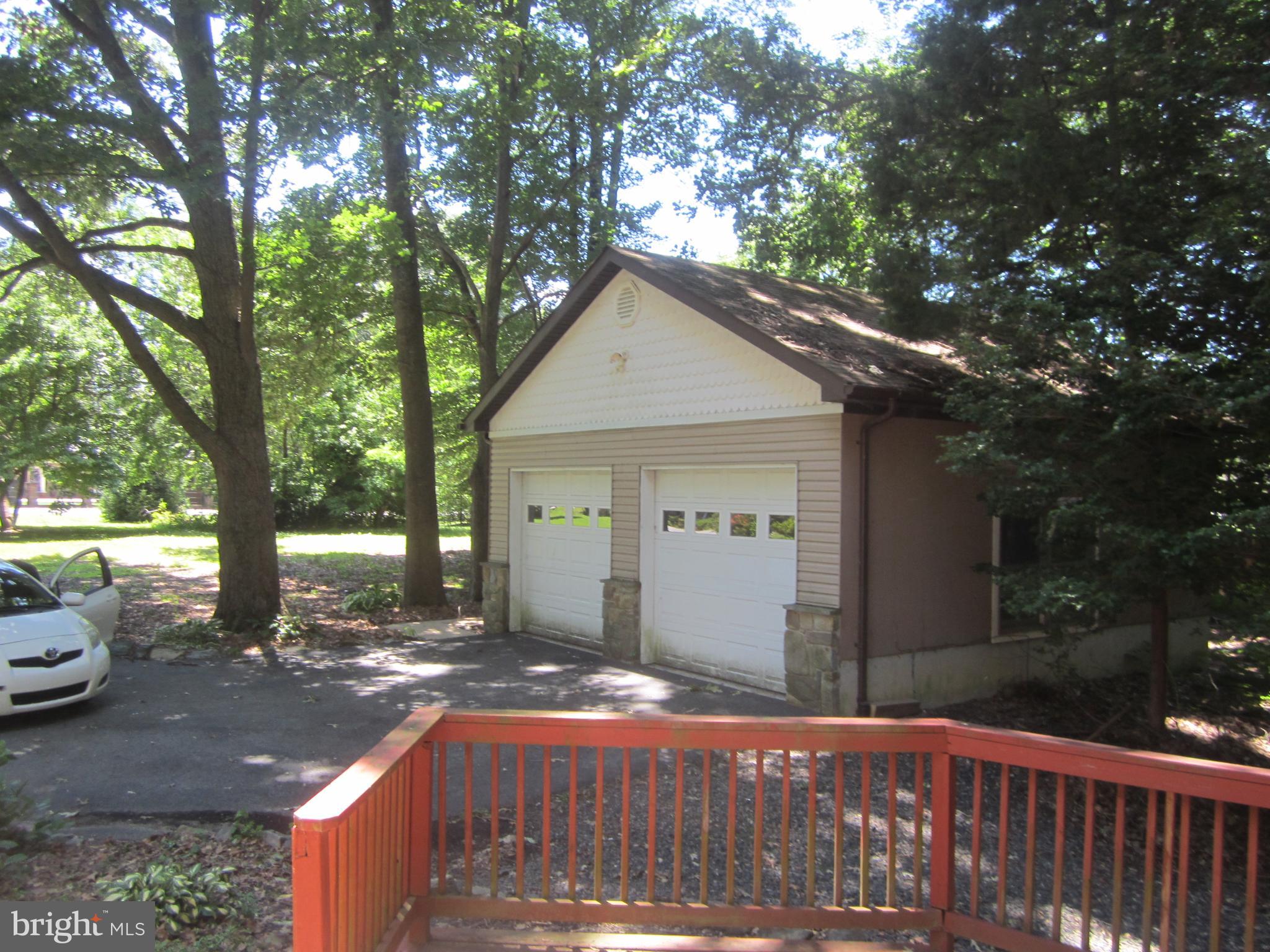3421 Holland Cliffs Road Huntingtown, MD 20639 - Photo 19 of 19 a front view of a house with a yard