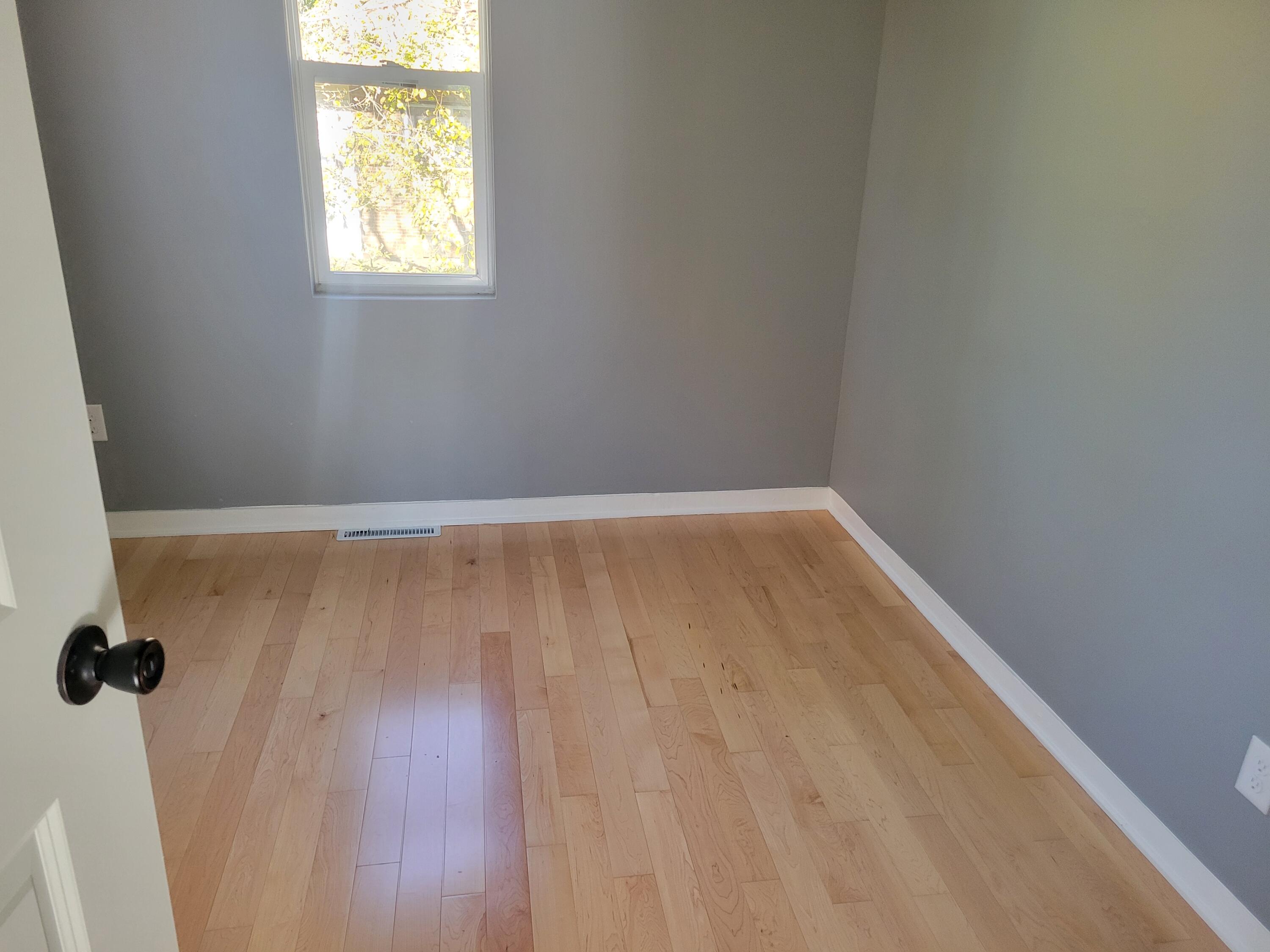 4738 Delaware Street Gary, IN 46409 - Photo 9 of 14 a view of an empty room with a window