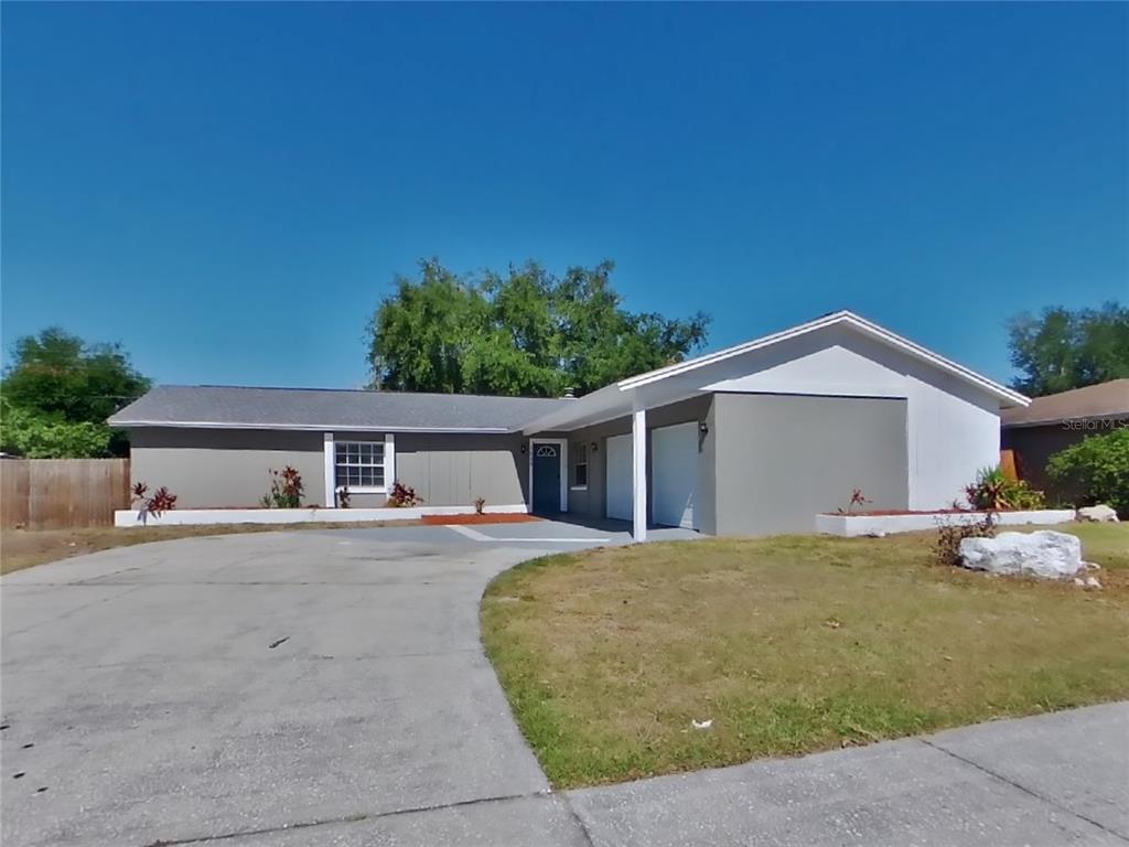 a house view with a outdoor space